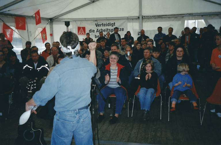 Kone plant shutdown rally, Hattingan, Germany, October 2005, singing "Which Side Are You On?"